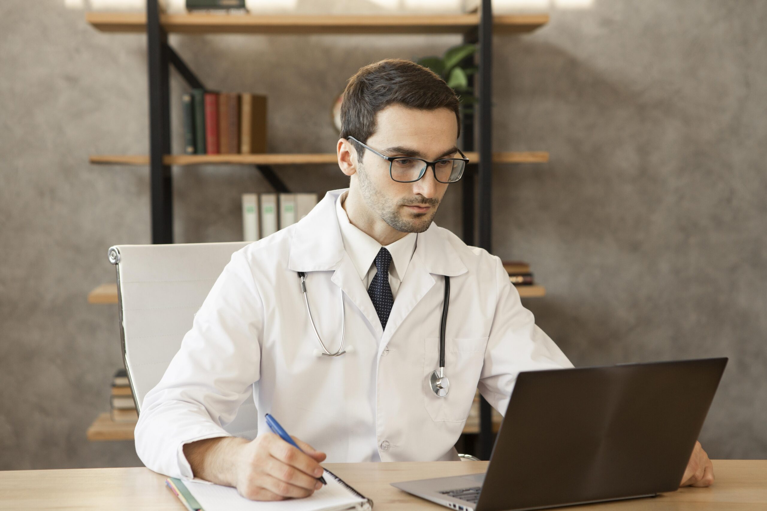 Physician studying hormone physiology in an online recorded pre-training module